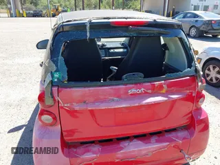 2012 Smart fortwo Pure z VIN WMEEJ3BA6CK527612, wystawiony jako IAAI lot #42750164 z przebiegiem Nie podano mil oraz . Historia ofert i sprzedaży dostępna na DreamBid. Obrazek 6.