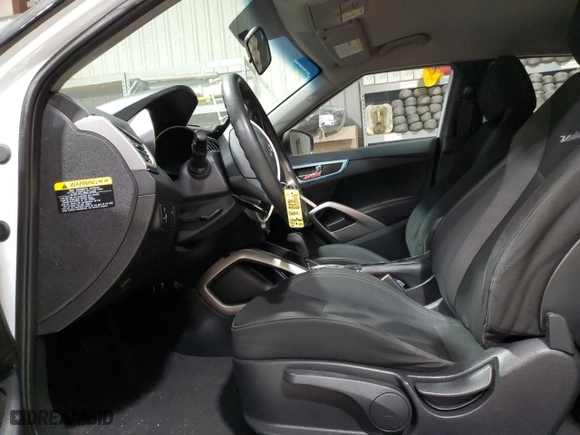 2016 Hyundai Veloster with VIN KMHTC6AD9GU264633, listed as a Copart auction lot 84188354 with 82,491 mi miles and Salvage Title. Bid and sale history available at carsss.com. Image 7.