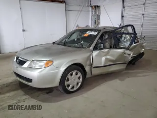 2002 Mazda Protege DX with VIN JM1BJ225021583998, listed as a Copart auction lot 49874135 with Not Provided miles and Non Repairable. Bid and sale history available at DreamBid. Image 1.