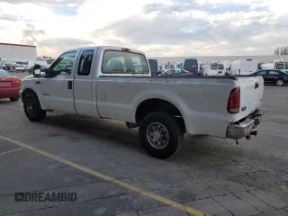 2002 Ford F-250 XL with VIN 1FTNX20F22ED31685, listed as a Copart auction lot 83911384 with 276,778 mi miles and Salvage title. Bid and sale history available at DreamBid. Image 2.