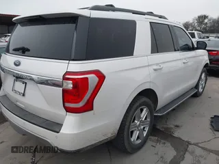 2018 Ford Expedition XLT with VIN 1FMJU1HT2JEA70497, listed as a IAAI auction lot 41397007 with 88,736 mi miles. Bid and sale history available at carsss.com. Image 4.