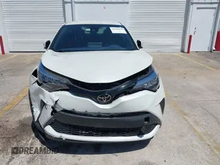 2021 Toyota C-HR LE with VIN JTNKHMBX8M1104427, listed as a IAAI auction lot 41948234 with 24,415 mi miles. Bid and sale history available at carsss.com. Image 12.