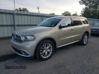 2014 Dodge Durango Citadel with VIN 1C4RDHEG0EC267046, listed as a Copart auction lot 64463325 with 137,048 mi miles and Salvage title. Bid and sale history available at DreamBid. Image 1.
