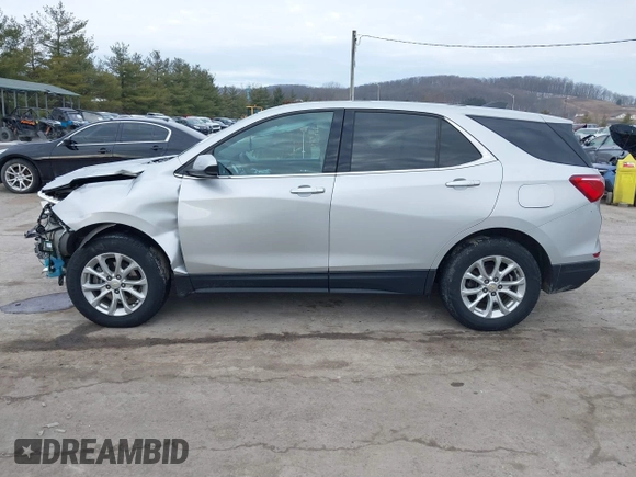 2018 Chevrolet Equinox LT z VIN 2GNAXSEV9J6212976, wystawiony jako IAAI lot #41643246 z przebiegiem 120 814 mil mil oraz . Historia ofert i sprzedaży dostępna na DreamBid. Obrazek 14.