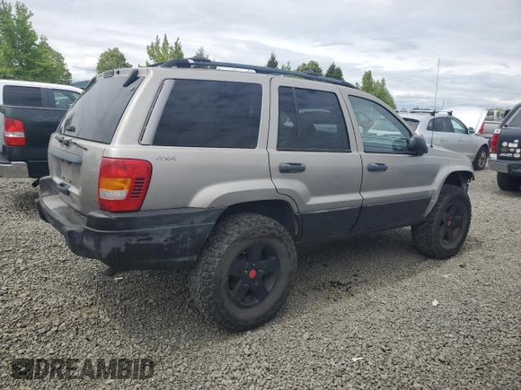 2000 Jeep Grand Cherokee Laredo with VIN 1J4GW48S9YC390448, listed as a Copart auction lot 56985265 with Not provided miles and Salvage title. Bid and sale history available at DreamBid. Image 3.