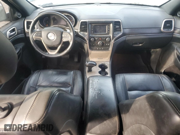 2014 Jeep Grand Cherokee Limited with VIN 1C4RJFBG8EC496303, listed as a Copart auction lot 56215195 with 129,269 mi miles and Salvage Title. Bid and sale history available at DreamBid. Image 8.