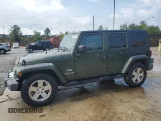 2008 Jeep Wrangler Unlimited Sahara z VIN 1J4GB59108L653823, wystawiony jako Copart lot #56324635 z przebiegiem 170 831 mil mil oraz Czysty tytuł • Clean title. Historia ofert i sprzedaży dostępna na DreamBid. Obrazek 1.