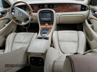 2004 Jaguar XJ with VIN SAJEA74C84SG03857, listed as a Copart auction lot 62156875 with 92,649 mi miles and Salvage title. Bid and sale history available at DreamBid. Image 8.