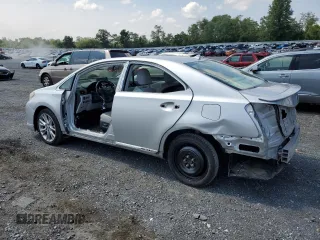 2010 Lexus HS 250h with VIN JTHBB1BA9A2024168, listed as a Copart auction lot 67244764 with 167,980 mi miles and Salvage Title. Bid and sale history available at carsss.com. Image 2.