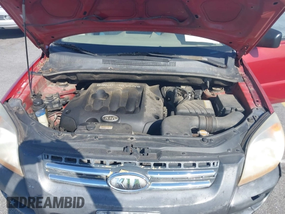 2007 Kia Sportage LX with VIN KNDJF724977426704, listed as a IAAI auction lot 41769772 with 288,082 mi miles and . Bid and sale history available at carsss.com. Image 10.