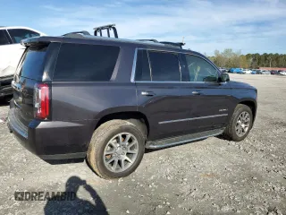 2015 GMC Yukon Denali with VIN 1GKS2CKJ9FR727818, listed as a Copart auction lot 50410655 with 0 mi miles and Salvage Title. Bid and sale history available at carsss.com. Image 3.