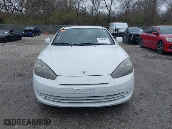 2008 Hyundai Tiburon GS z VIN KMHHM66D58U283273, wystawiony jako IAAI lot #41900097 z przebiegiem 154 013 mil mil oraz . Historia ofert i sprzedaży dostępna na DreamBid. Obrazek 13.