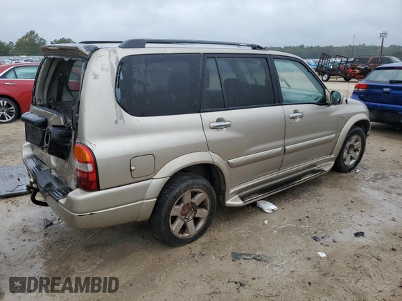 2001 Suzuki XL7 Touring z VIN JS3TY92V714106251, wystawiony jako Copart lot #79281204 z przebiegiem 334 901 mil mil oraz Szkoda całkowita • Salvage title. Historia ofert i sprzedaży dostępna na DreamBid. Obrazek 3.