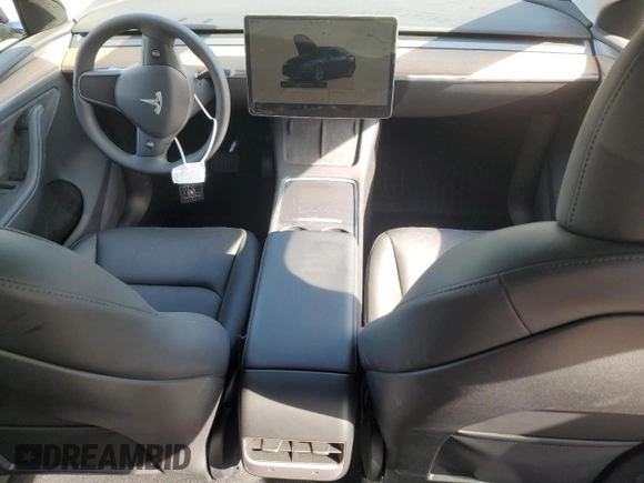 2024 Tesla Model Y Long Range with VIN 7SAYGDEE7RA307013, listed as a Copart auction lot 54767595 with 12,953 mi miles and Salvage Title. Bid and sale history available at DreamBid. Image 8.