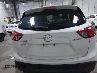 2014 Mazda CX-5 Touring with VIN JM3KE4CY4E0349034, listed as a IAAI auction lot 41478954 with 117,502 mi miles. Bid and sale history available at carsss.com. Image 16.