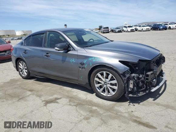 2014 Infiniti Q50 Hybrid Premium with VIN JN1AV7AP5EM690504, listed as a Copart auction lot 55511065 with 79,307 mi miles and Salvage title. Bid and sale history available at DreamBid. Image 4.