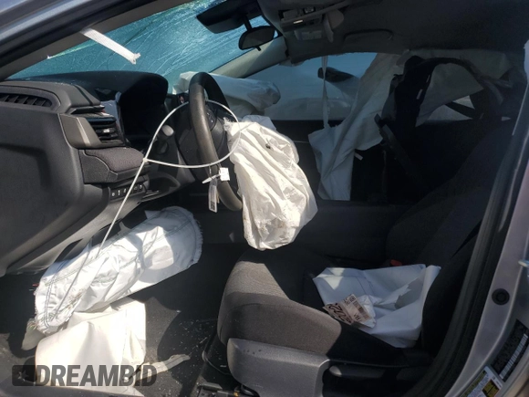 2025 Toyota Camry LE z VIN 4T1DAACK1SU529384, wystawiony jako Copart lot #56388785 z przebiegiem Nie podano mil oraz Czysty tytuł • Clean title. Historia ofert i sprzedaży dostępna na DreamBid. Obrazek 7.