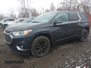2021 Chevrolet Traverse LT Cloth z VIN 1GNERGKW9MJ234571, wystawiony jako IAAI lot #41844031 z przebiegiem 58 785 mil mil oraz . Historia ofert i sprzedaży dostępna na DreamBid. Obrazek 18.