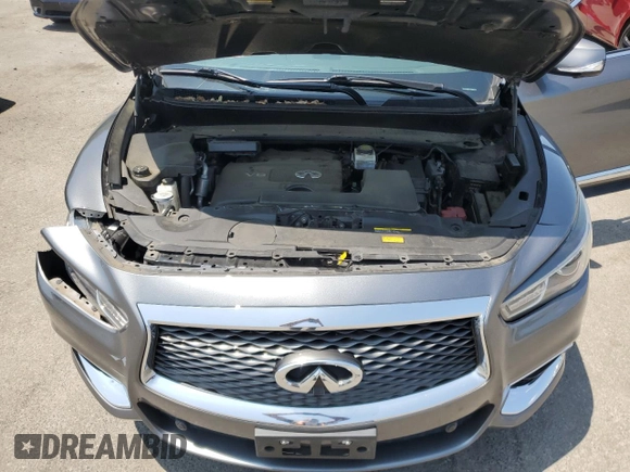 2019 Infiniti QX60 Luxe with VIN 5N1DL0MM1KC504950, listed as a Copart auction lot 61621525 with 95,199 mi miles and Salvage title. Bid and sale history available at DreamBid. Image 12.