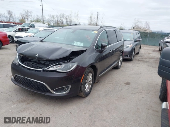 2017 Chrysler Pacifica Touring L with VIN 2C4RC1BG1HR797200, listed as a IAAI auction lot 42044020 with 124,115 mi miles and . Bid and sale history available at DreamBid. Image 17.