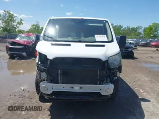 2016 Ford Transit Cargo with VIN 1FTYR2ZM5GKA32015, listed as a IAAI auction lot 42288362 with 227,261 mi miles and . Bid and sale history available at DreamBid. Image 13.