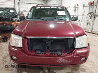 2006 GMC Envoy SLT with VIN 1GKDS13S362135683, listed as a IAAI auction lot 41477501 with 214,760 mi miles. Bid and sale history available at carsss.com. Image 12.