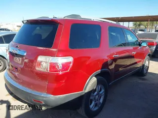 2010 GMC Acadia SL with VIN 1GKLRKED2AJ142750, listed as a IAAI auction lot 41851697 with 127,118 mi miles. Bid and sale history available at carsss.com. Image 4.
