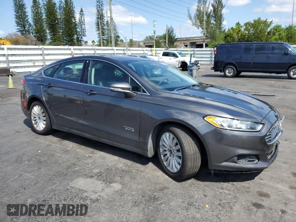 2016 Ford Fusion Energi SE Luxury with VIN 3FA6P0PU6GR310541, listed as a Copart auction lot 52297815 with 122,985 mi miles and Non Repairable. Bid and sale history available at carsss.com. Image 4.