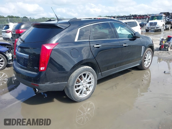 2014 Cadillac SRX Performance Collection с VIN 3GYFNFE38ES656510, выставлен на аукционе IAAI как лот 42336472 с пробегом 125 269 миль миль и . История ставок и продаж доступна на DreamBid. Изображение 4.