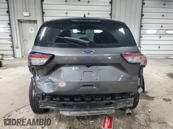 2021 Ford Escape Titanium Hybrid z VIN 1FMCU9DZ8MUA56194, wystawiony jako Copart lot #51427475 z przebiegiem 40 471 mil mil oraz Szkoda całkowita • Salvage title. Historia ofert i sprzedaży dostępna na DreamBid. Obrazek 6.