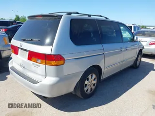 2002 Honda Odyssey EX-L z VIN 5FNRL18062B011890, wystawiony jako IAAI lot #41972294 z przebiegiem 245 889 mil mil oraz . Historia ofert i sprzedaży dostępna na DreamBid. Obrazek 4.