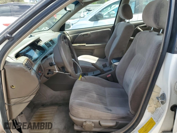 1998 Toyota Camry LE z VIN JT2BF28K3W0115122, wystawiony jako Copart lot #52645095 z przebiegiem 361 549 mil mil oraz Szkoda całkowita • Salvage title. Historia ofert i sprzedaży dostępna na DreamBid. Obrazek 7.