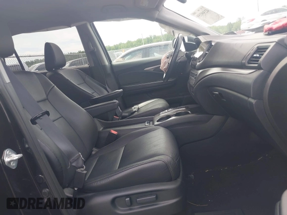 2021 Honda Pilot EX-L with VIN 5FNYF6H53MB097089, listed as a IAAI auction lot 42309359 with 58,371 mi miles and . Bid and sale history available at DreamBid. Image 5.