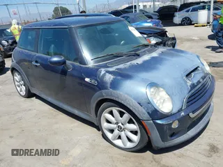 2006 MINI Hardtop S with VIN WMWRE33536TJ35740, listed as a IAAI auction lot 42720196 with 165,852 mi miles and . Bid and sale history available at DreamBid. Image 1.