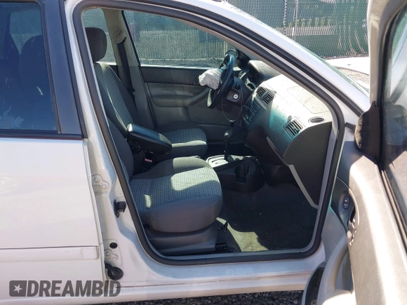 2007 Ford Focus S z VIN 1FAFP34N37W319953, wystawiony jako IAAI lot #41737822 z przebiegiem 208 801 mil mil oraz . Historia ofert i sprzedaży dostępna na DreamBid. Obrazek 5.