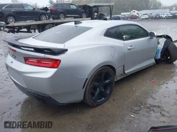 2017 Chevrolet Camaro 1LT z VIN 1G1FB1RXXH0179842, wystawiony jako IAAI lot #42192280 z przebiegiem 89 548 mil mil oraz . Historia ofert i sprzedaży dostępna na DreamBid. Obrazek 4.