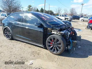2024 Tesla Model X Plaid with VIN 7SAXCBE65RF444149, listed as a IAAI auction lot 41799473 with 6,204 mi miles and . Bid and sale history available at DreamBid. Image 1.