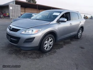 2011 Mazda CX-9 Touring with VIN JM3TB2CV6B0327698, listed as a IAAI auction lot 41583023 with 174,461 mi miles. Bid and sale history available at carsss.com. Image 2.