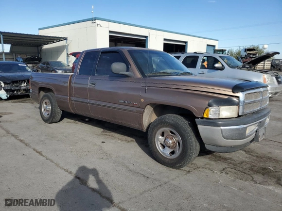 2000 Dodge Ram 1500 with VIN 3B7HC13Z8YM241128, listed as a Copart auction lot 76496774 with 125,929 mi miles and Salvage Title. Bid and sale history available at carsss.com. Image 4.
