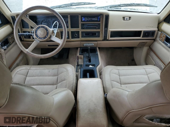 1990 Jeep Grand Wagoneer z VIN 1J4FN78L0LL282169, wystawiony jako Copart lot #59809545 z przebiegiem 194 382 mil mil oraz Czysty tytuł • Clean title. Historia ofert i sprzedaży dostępna na DreamBid. Obrazek 8.