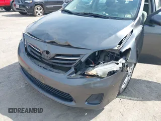 2013 Toyota Corolla L with VIN 2T1BU4EE7DC100830, listed as a IAAI auction lot 42032150 with 205,914 mi miles. Bid and sale history available at carsss.com. Image 6.
