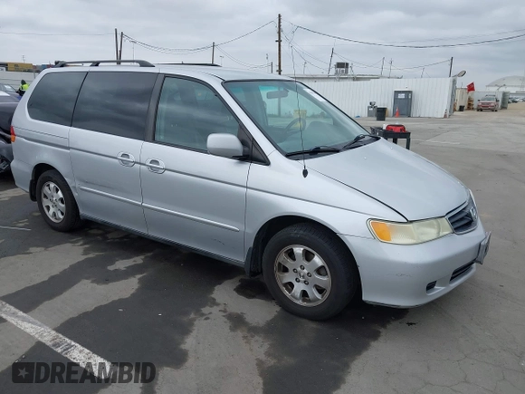 2003 Honda Odyssey EX-L with VIN 5FNRL18943B030373, listed as a IAAI auction lot 41867289 with 179,718 mi miles and . Bid and sale history available at DreamBid. Image 1.