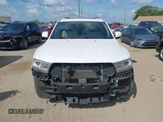 2014 Dodge Durango Limited with VIN 1C4RDJDGXEC323129, listed as a IAAI auction lot 42318727 with 148,451 mi miles and . Bid and sale history available at DreamBid. Image 6.