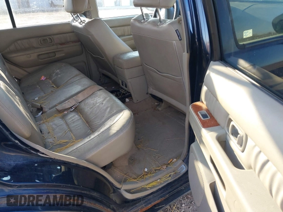 2002 Infiniti QX4 Luxury z VIN JNRDR09Y52W252374, wystawiony jako IAAI lot #41751643 z przebiegiem 183 000 mil mil oraz . Historia ofert i sprzedaży dostępna na DreamBid. Obrazek 8.