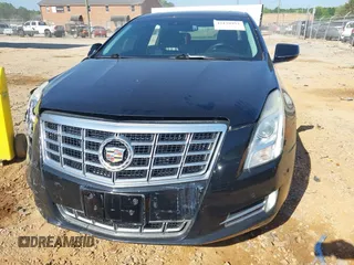 2014 Cadillac XTS Luxury z VIN 2G61M5S30E9229758, wystawiony jako IAAI lot #42179952 z przebiegiem 125 848 mil mil oraz . Historia ofert i sprzedaży dostępna na DreamBid. Obrazek 12.