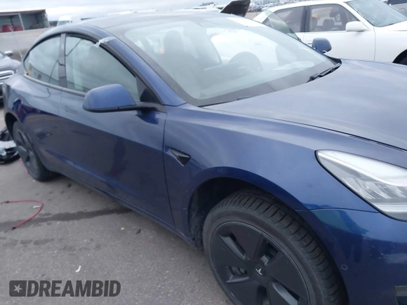 2021 Tesla Model 3 Long Range with VIN 5YJ3E1EB8MF848049, listed as a IAAI auction lot 40974331 with 61,462 mi miles. Bid and sale history available at carsss.com. Image 6.