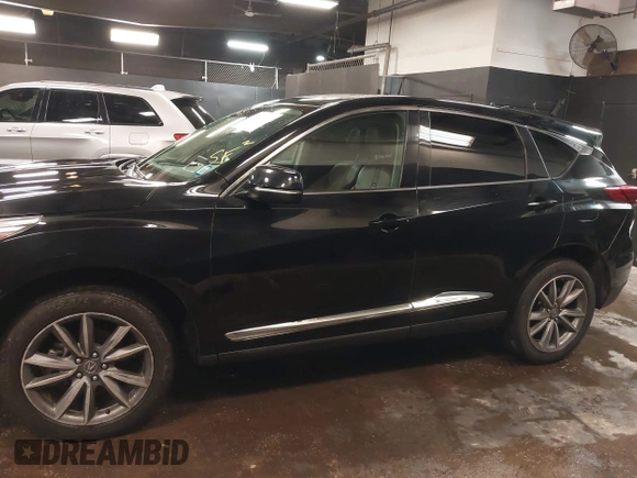 2020 Acura RDX Technology with VIN 5J8TC2H50LL010306, listed as a IAAI auction lot 41589653 with 73,123 mi miles and . Bid and sale history available at DreamBid. Image 13.