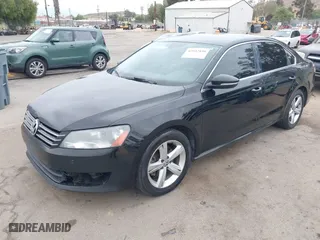 2012 Volkswagen Passat SE with VIN 1VWBP7A30CC026507, listed as a IAAI auction lot 42042850 with 202,406 mi miles. Bid and sale history available at carsss.com. Image 2.
