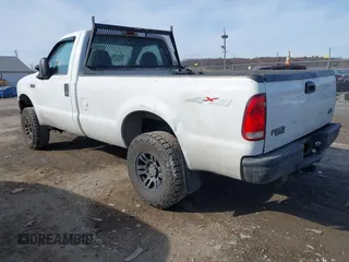 1999 Ford Super Duty F-250 XL with VIN 1FTNF21F3XEC26324, listed as a IAAI auction lot 41433149 with 203,634 mi miles. Bid and sale history available at carsss.com. Image 3.
