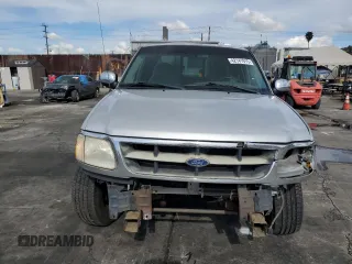 1998 Ford F-150 XL with VIN 1FTRX17L3WKB36791, listed as a Copart auction lot 42141915 with 201,067 mi miles and Salvage title. Bid and sale history available at DreamBid. Image 5.